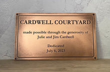 Bronze plaque with custom engraved text and border, real bronze dedication sign.