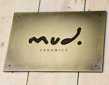 Custom brass business sign with engraved logo - solid brass, antiqued finish