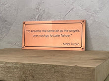 Copper plaque with Mark Twain quote.