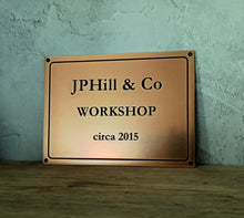 Bronze signage, bronze plates custom-made with engraved text or design.