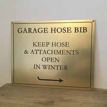 Thick brass signage with custom text, arrows and border, made by 3Dprintshed